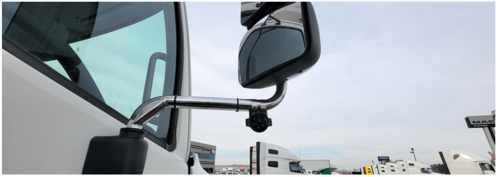 Mirror-mount side camera installed on a commercial truck